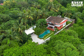 StayVista at Casa Chalora with Pool, BBQ, Games Room